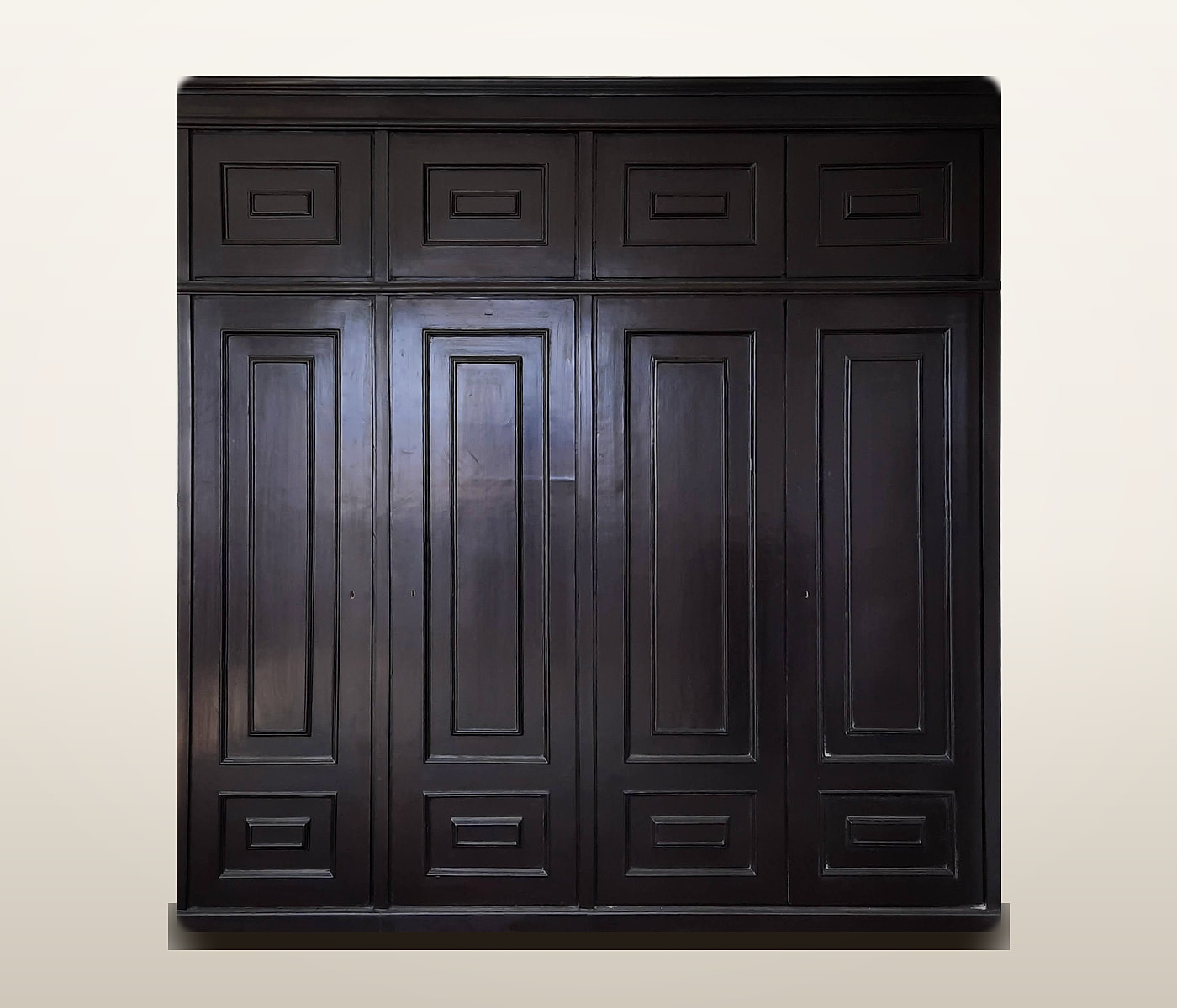 Four-door espresso wardrobe with top cabinets, made to measure by Jarghaa Furniture in Lalitpur