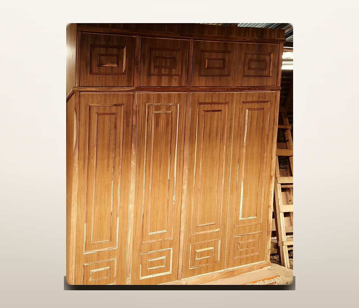 Solid teak four-door wardrobe with top cabinets, built in the Jarghaa Furniture workshop