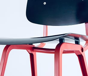 Red and black wooden chair made by Jarghaa Furniture