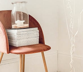 Wooden dining table and chairs in a dining room